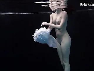 Redhead beauty in the uninspired dress